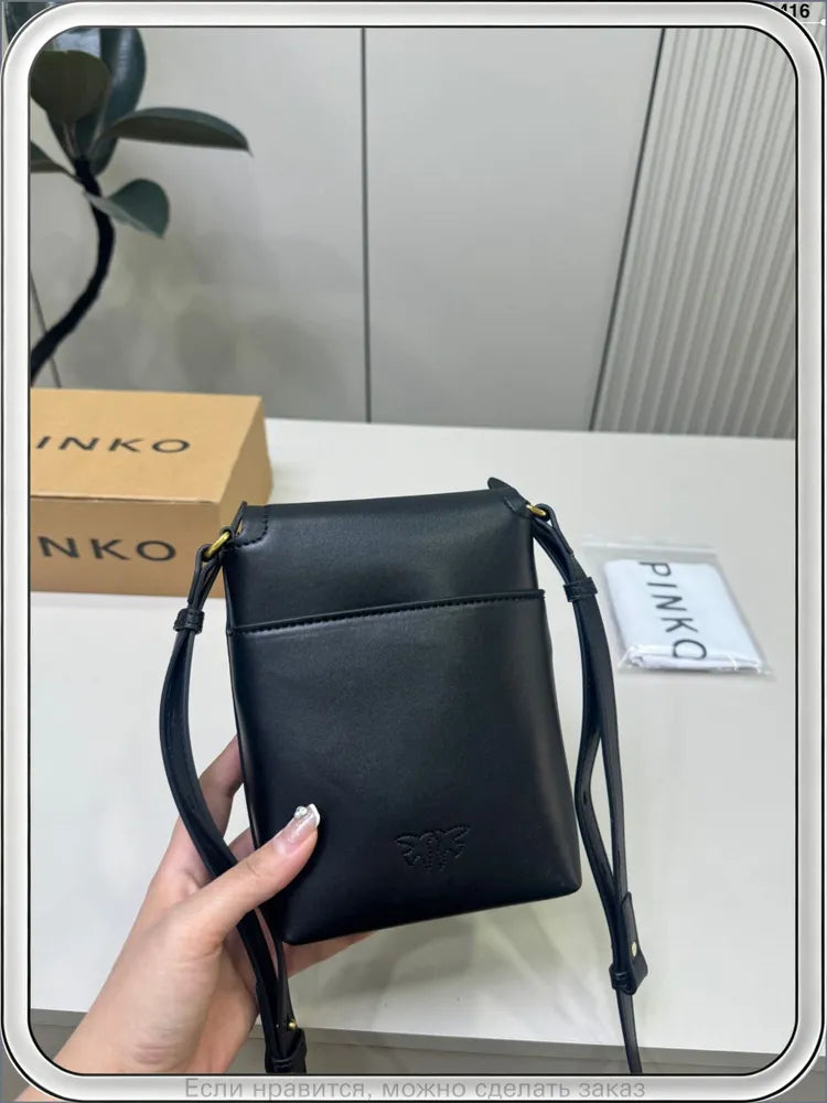 Qara mini çarpaz çanta, arxa görünüş